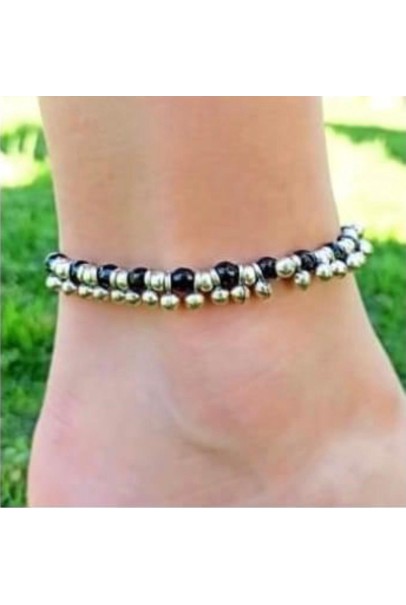 Black glass beads with brass silver tone hanging anklet